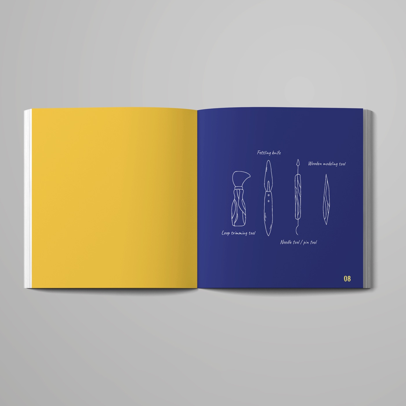 The printed book open at page 08: a blank yellow page facing blue tool reference drawings with handwritten labels.